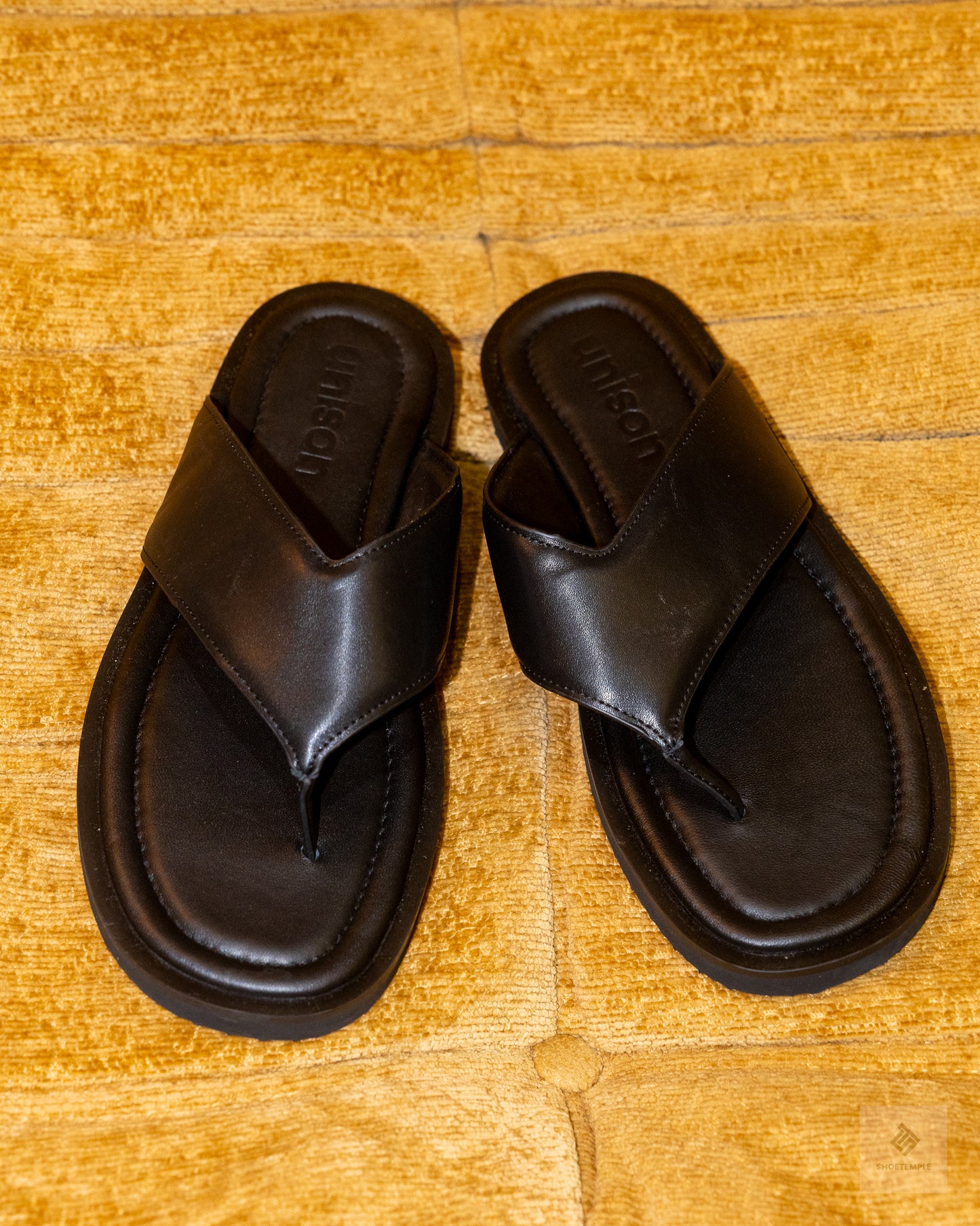 Unison Trent Leather Thong is a luxe leather sandal Black