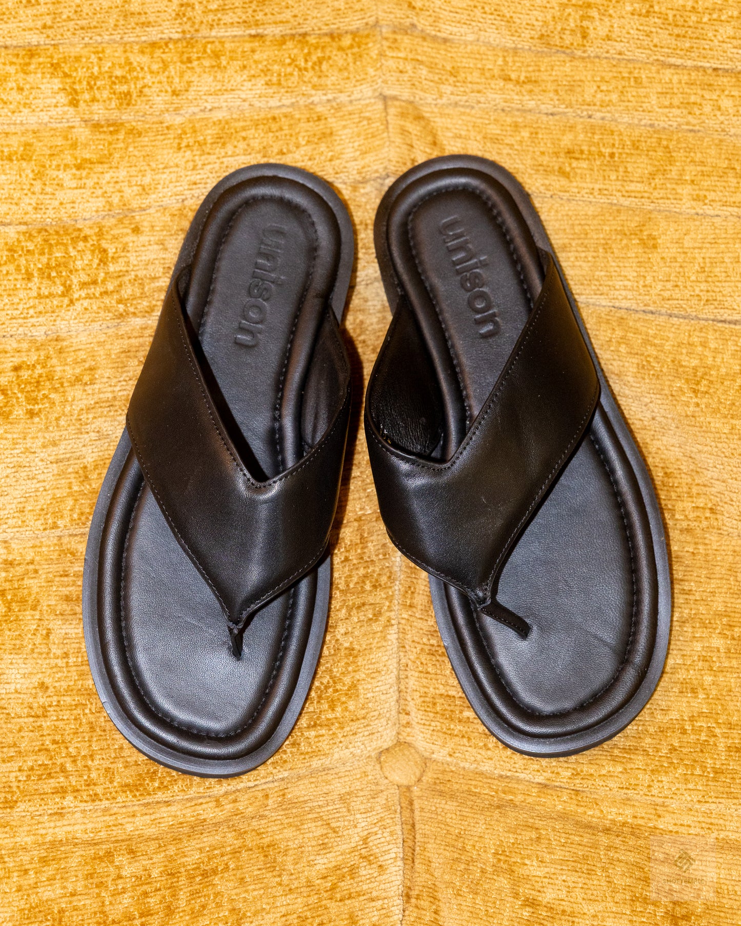 Unison Trent Leather Thong is a luxe leather sandal Black