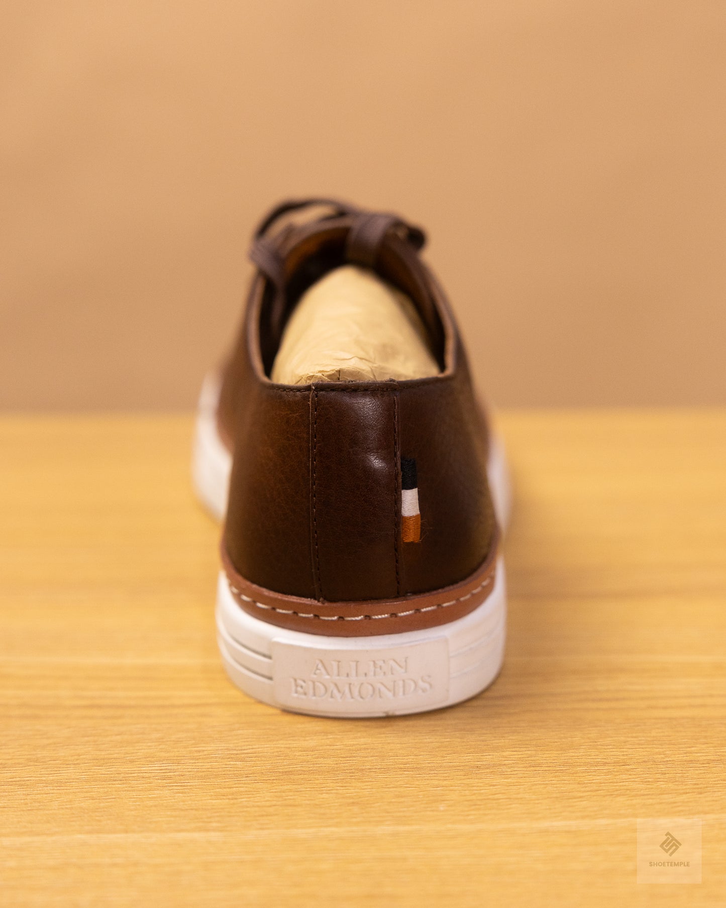 Allen Edmonds Paxton Casual Lace-Up Sneaker in dark brown leather.