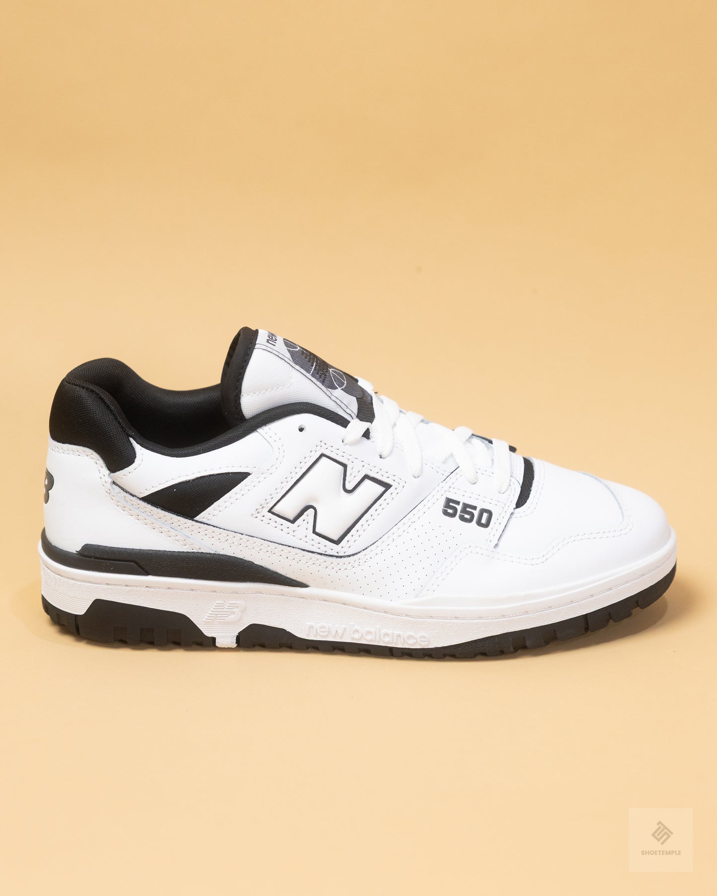New Balance 550 sneakers in white and black