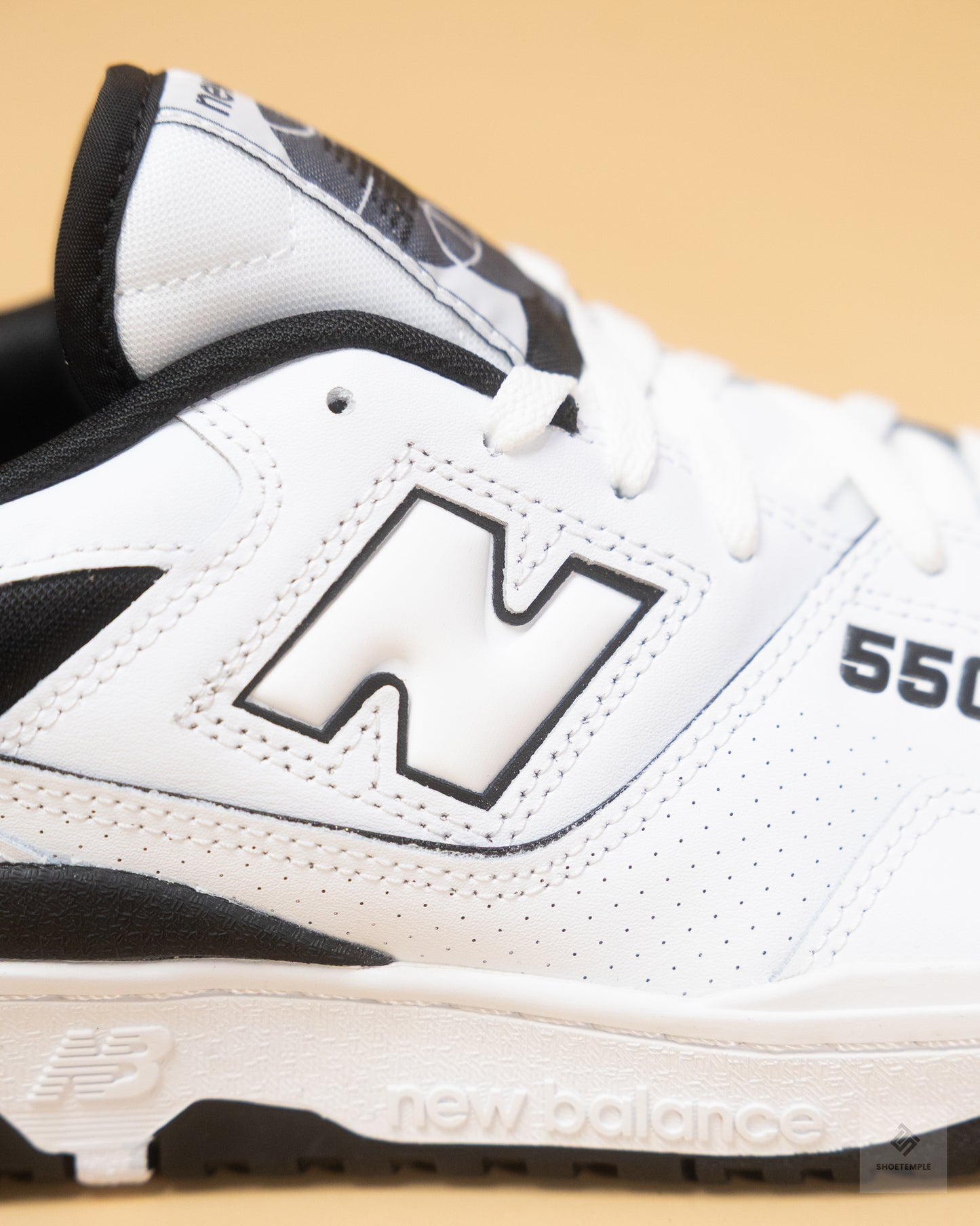 New Balance 550 sneakers in white and black