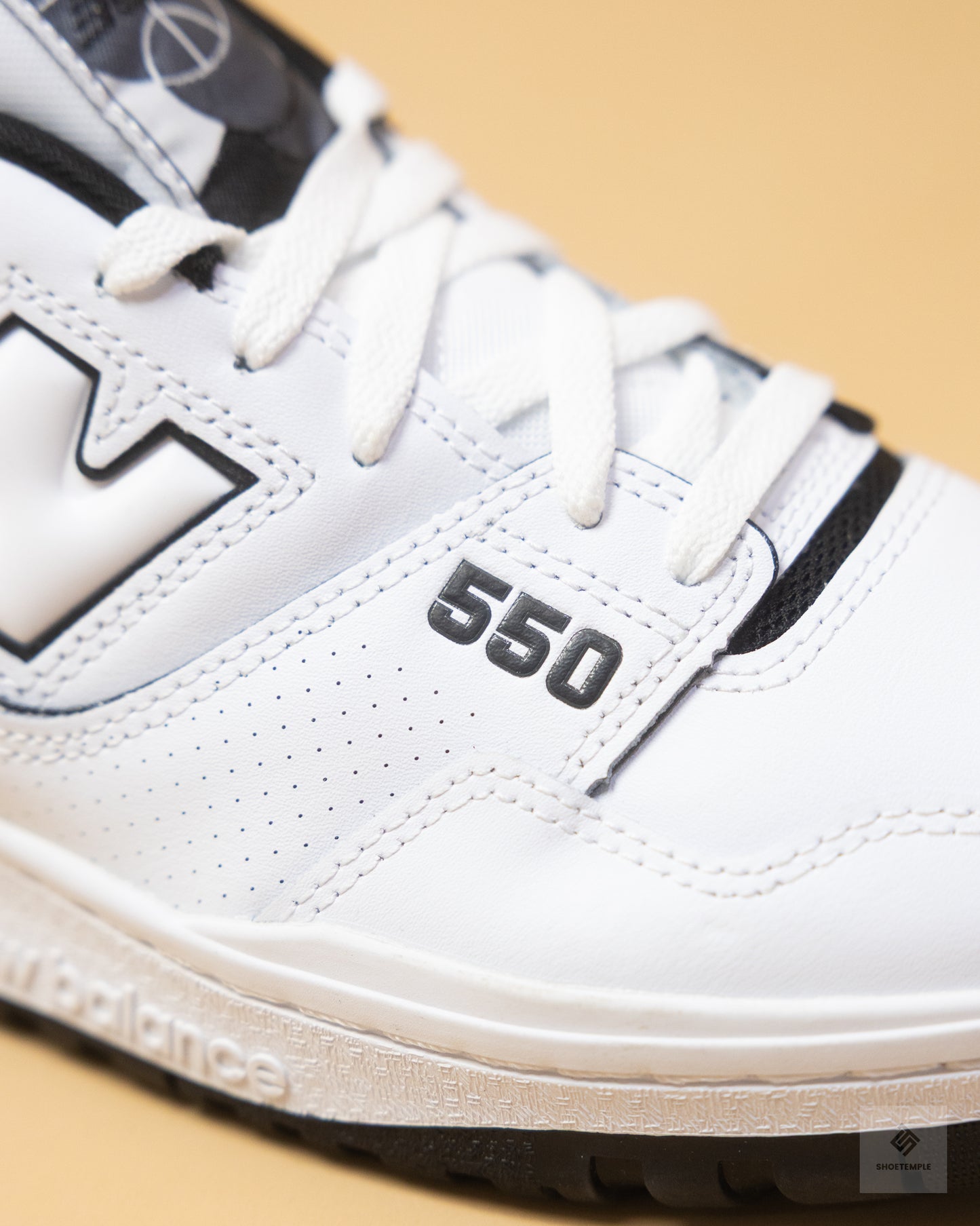 New Balance 550 sneakers in white and black