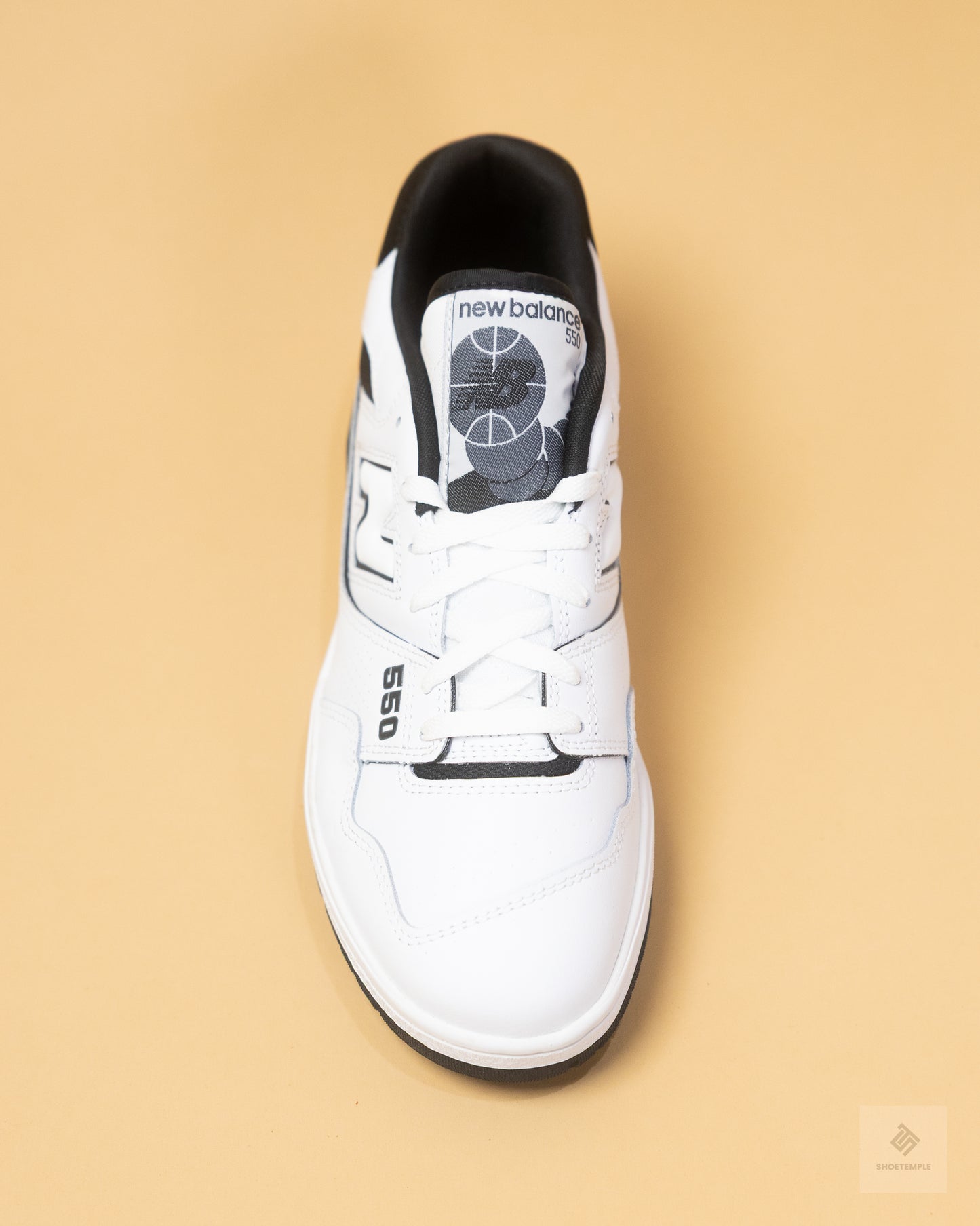 New Balance 550 sneakers in white and black