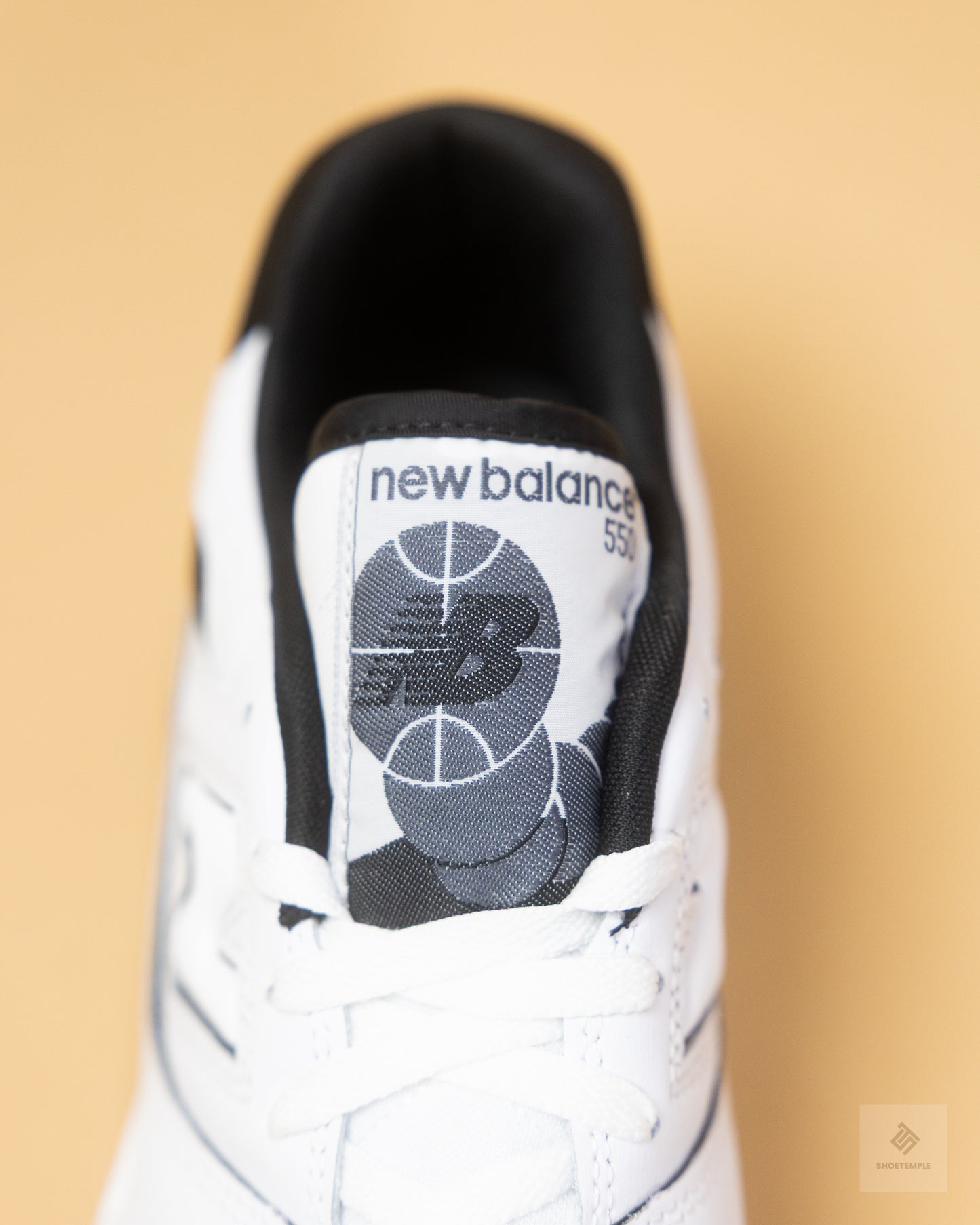 New Balance 550 sneakers in white and black