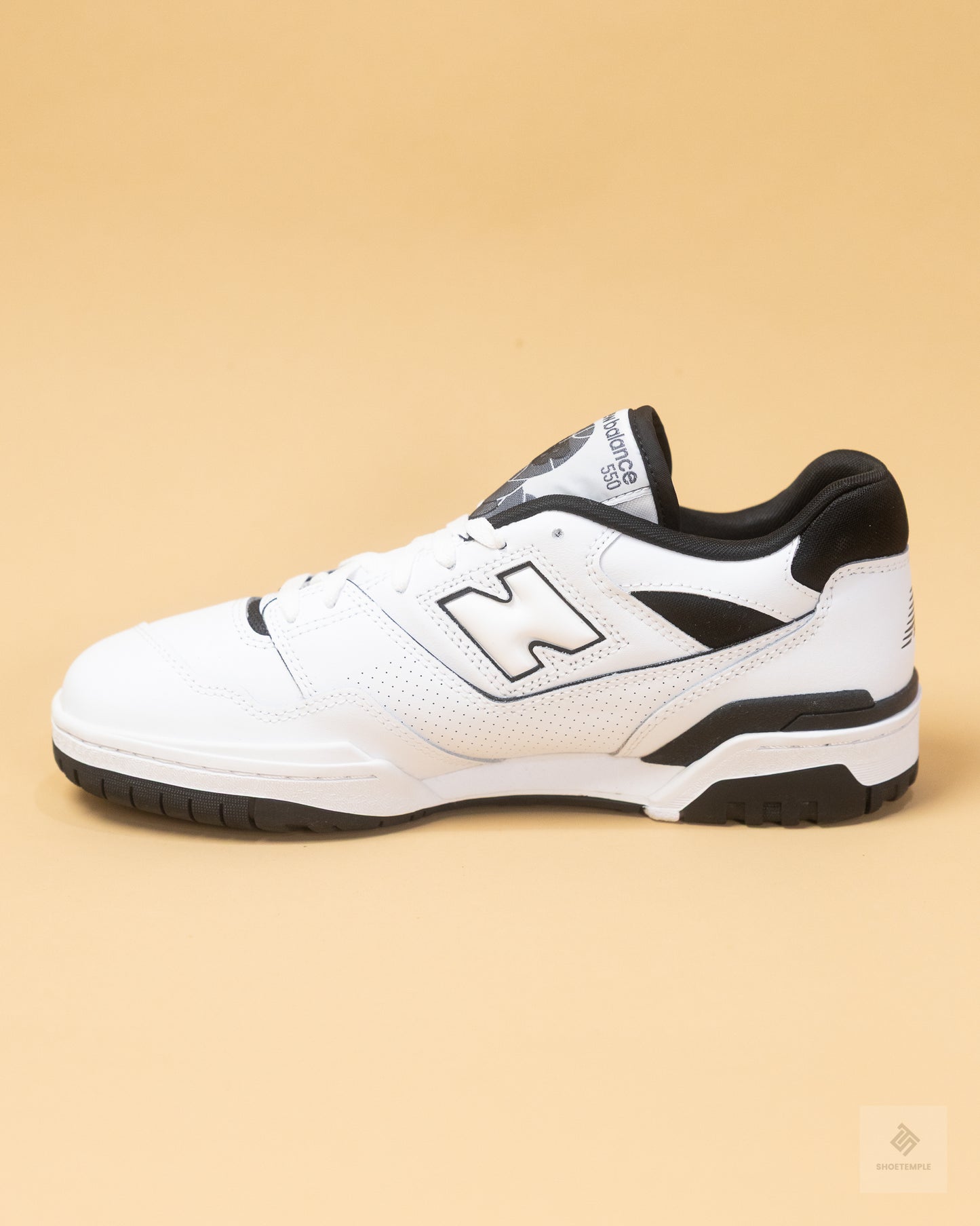 New Balance 550 sneakers in white and black