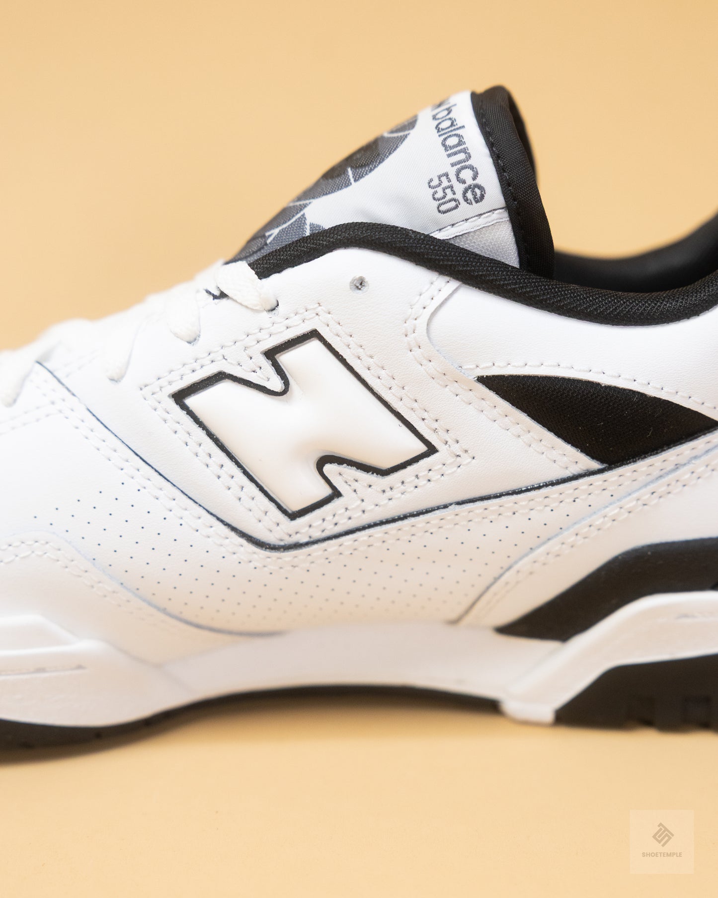 New Balance 550 sneakers in white and black