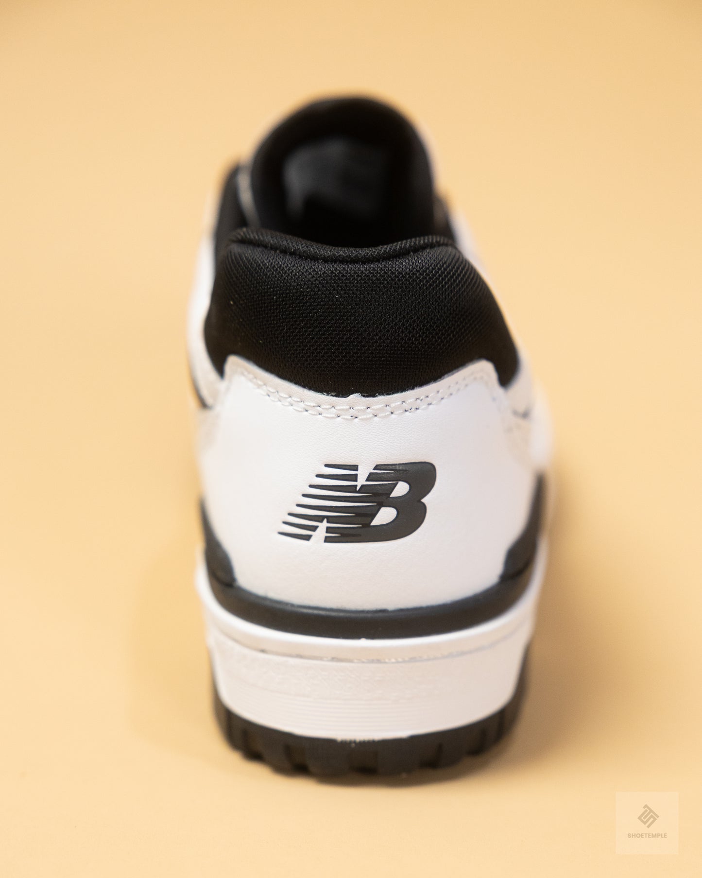 New Balance 550 sneakers in white and black