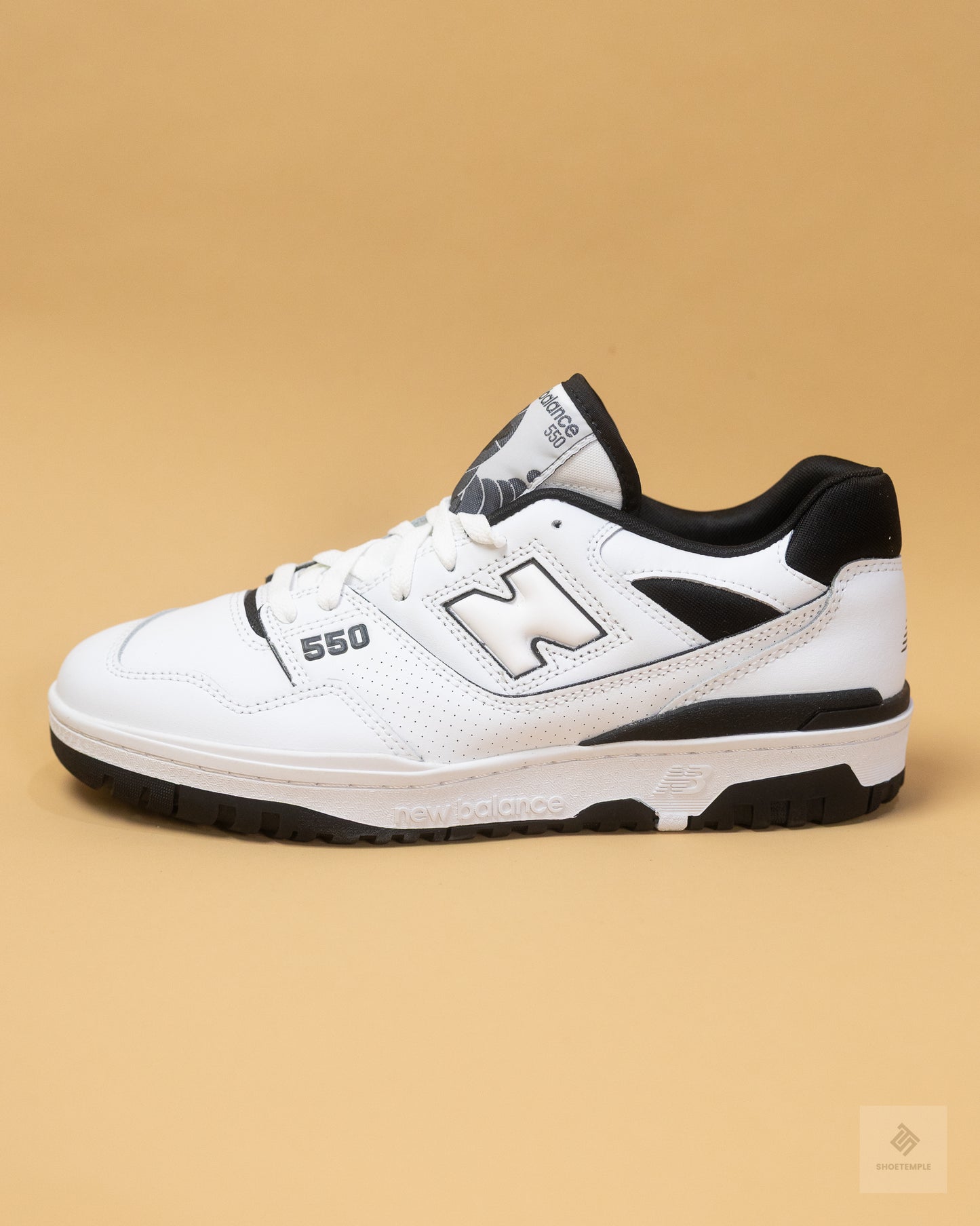 New Balance 550 sneakers in white and black