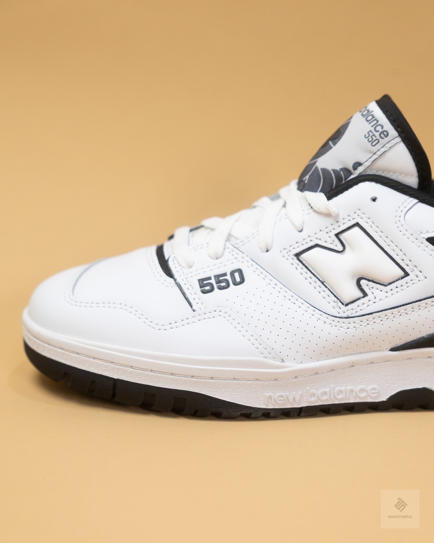 New Balance 550 sneakers in white and black