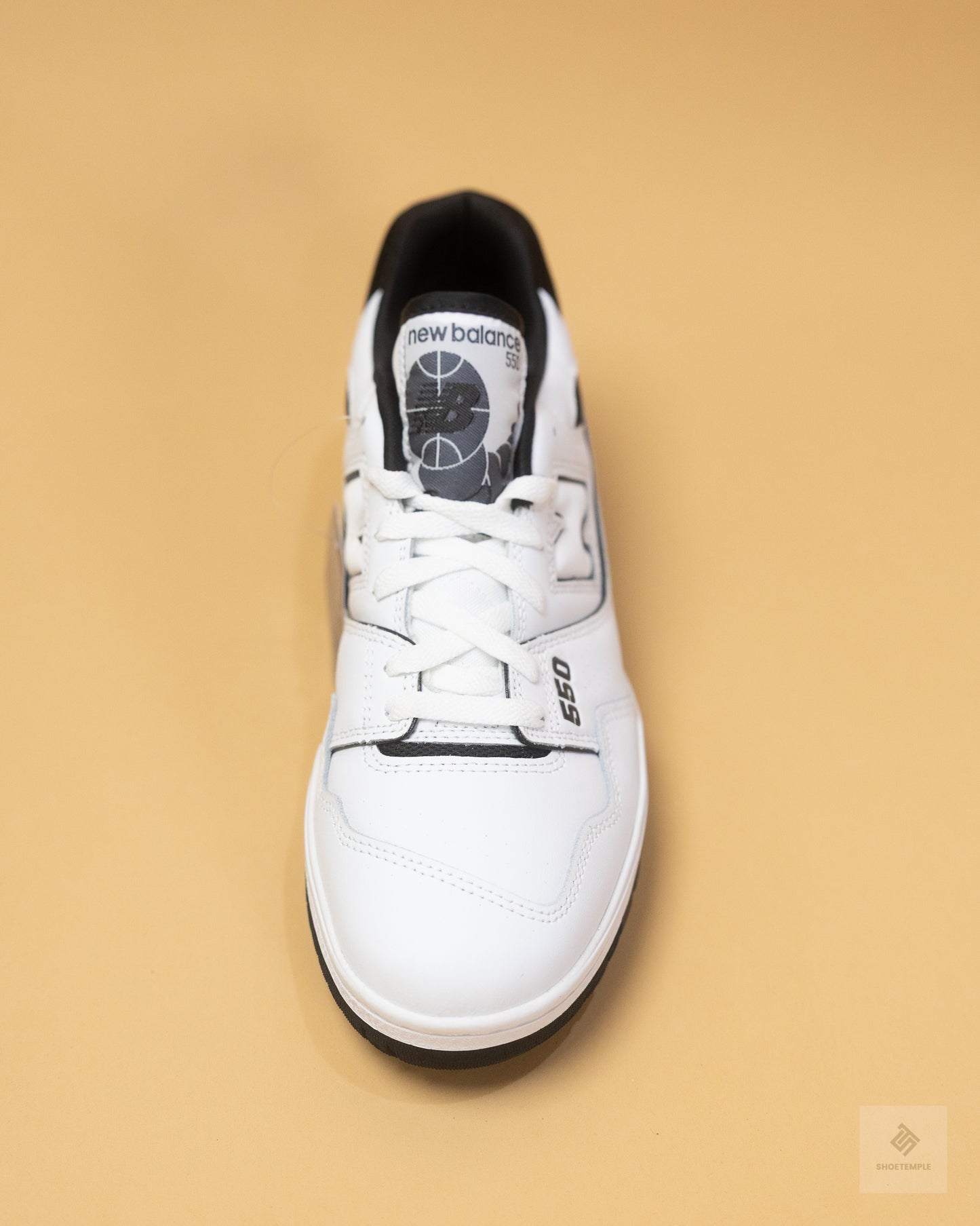 New Balance 550 sneakers in white and black