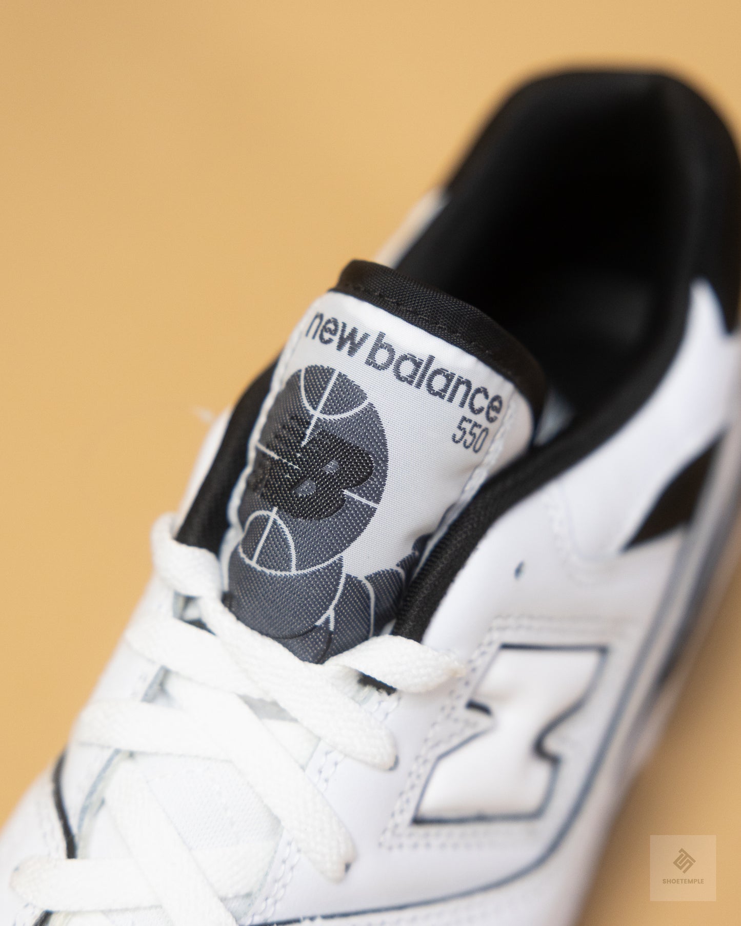 New Balance 550 sneakers in white and black