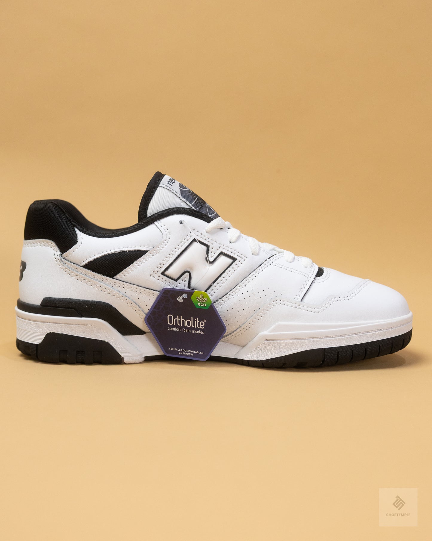 New Balance 550 sneakers in white and black