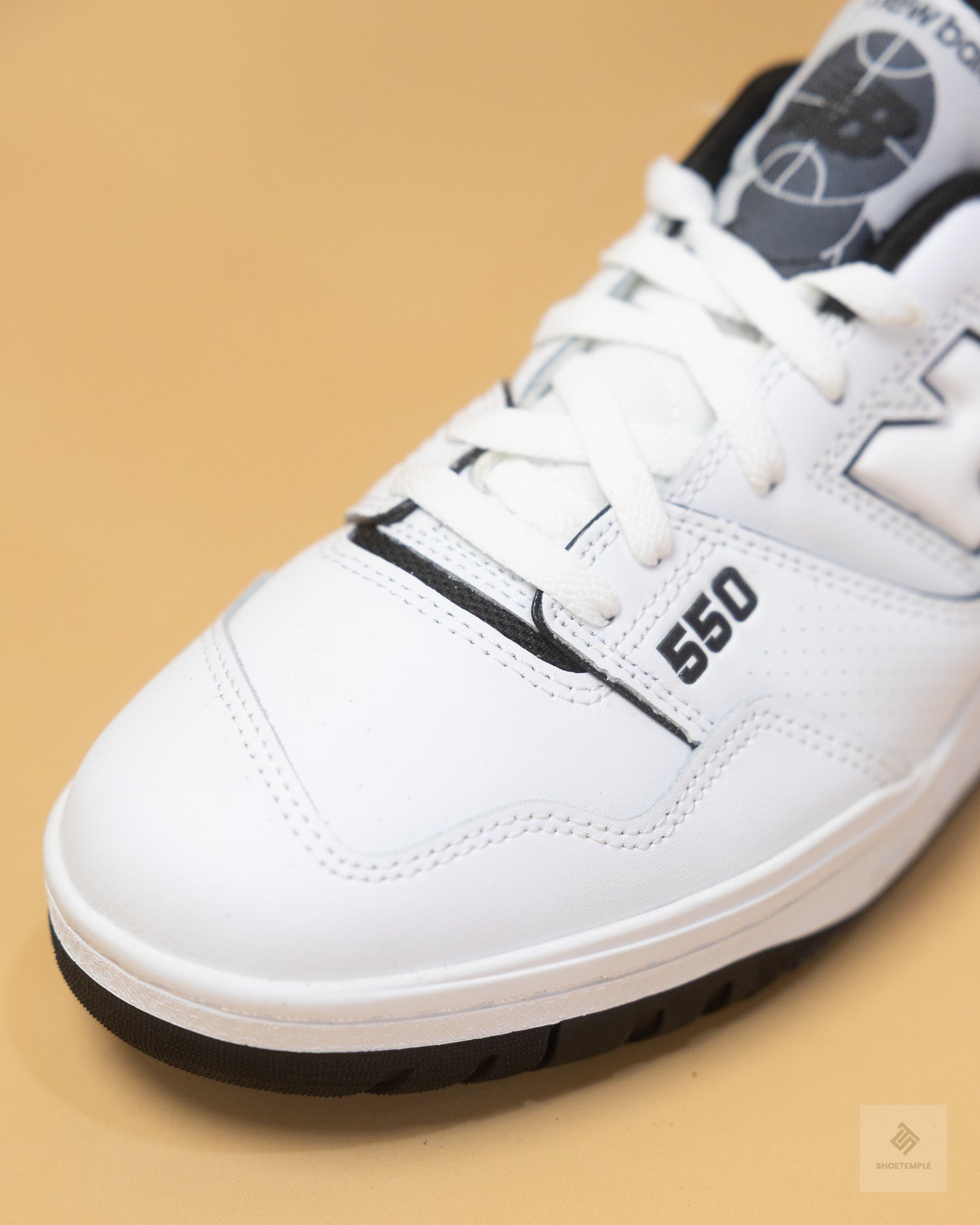 New Balance 550 sneakers in white and black