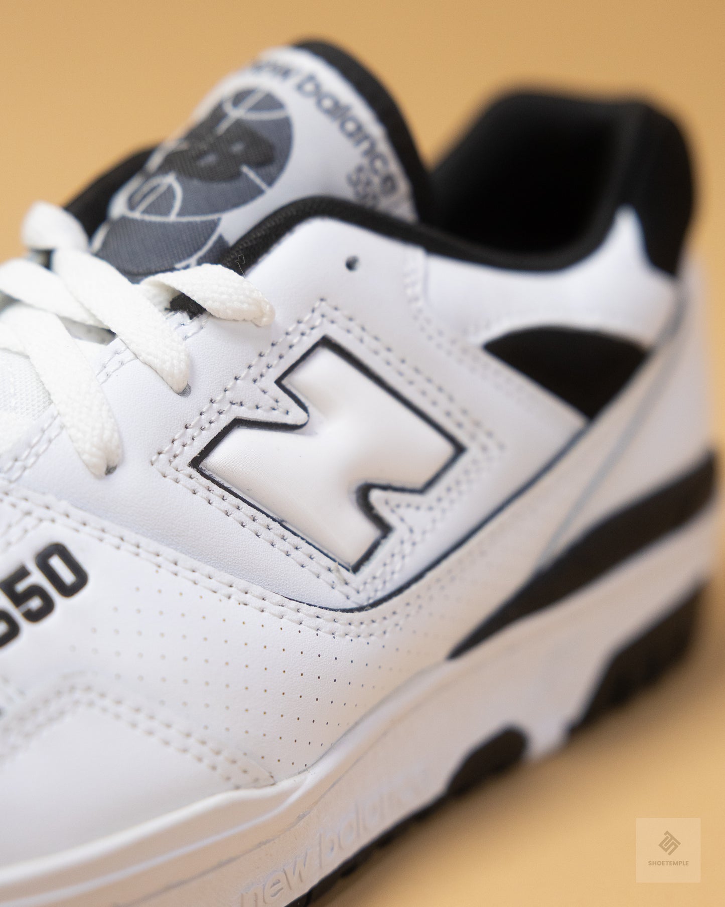 New Balance 550 sneakers in white and black