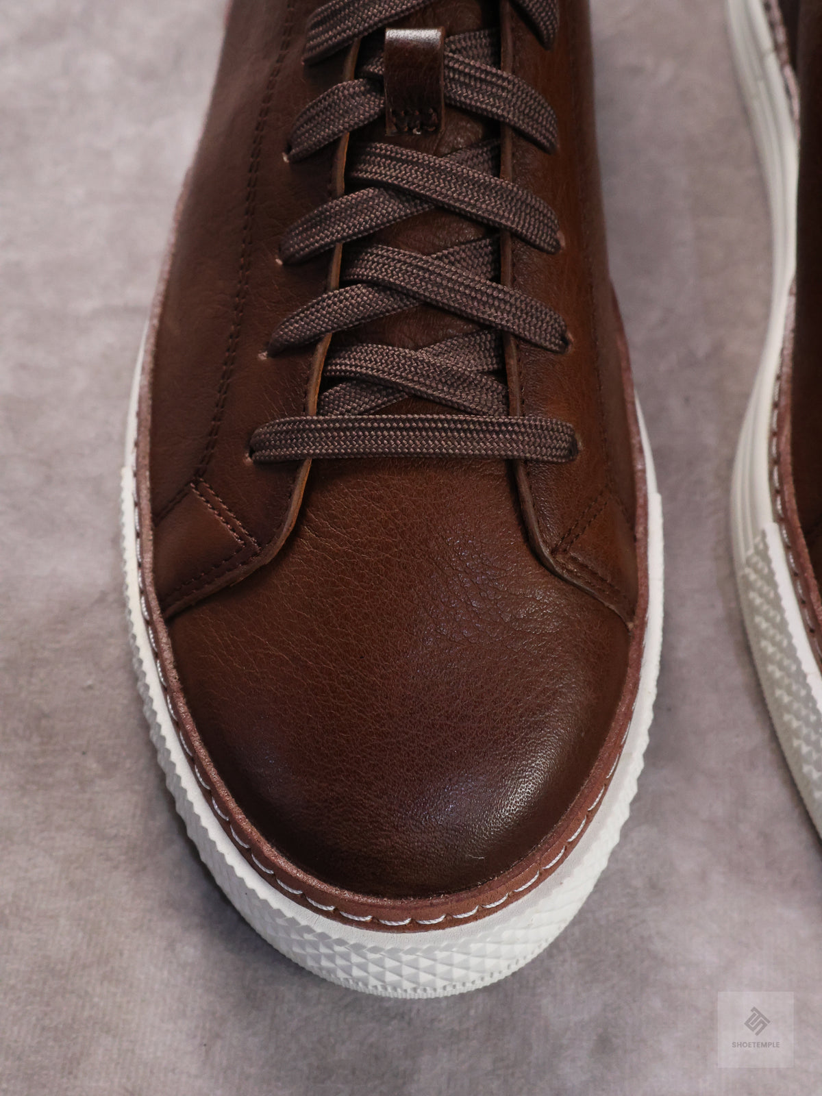 Allen Edmonds Paxton Casual Lace-Up Sneaker in dark brown leather.
