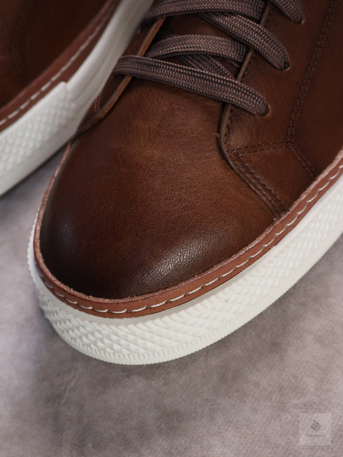 Allen Edmonds Paxton Casual Lace-Up Sneaker in dark brown leather.