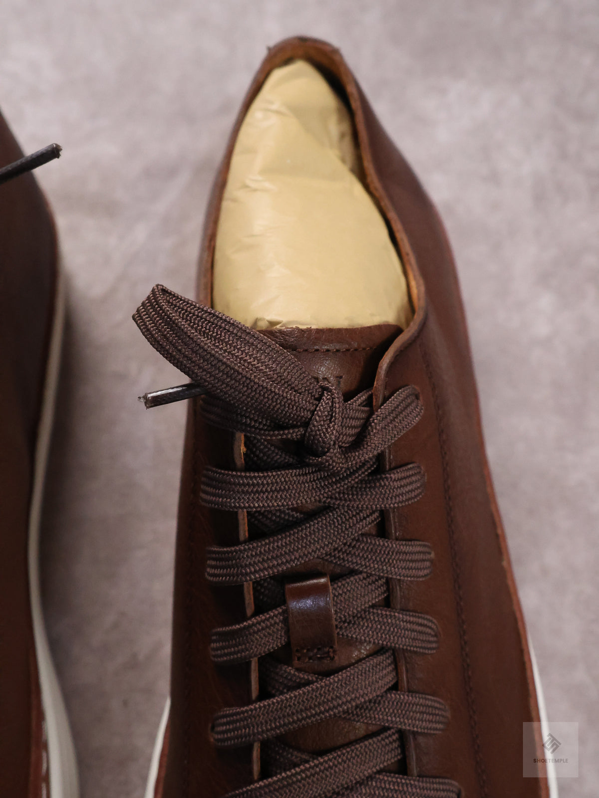 Allen Edmonds Paxton Casual Lace-Up Sneaker in dark brown leather.